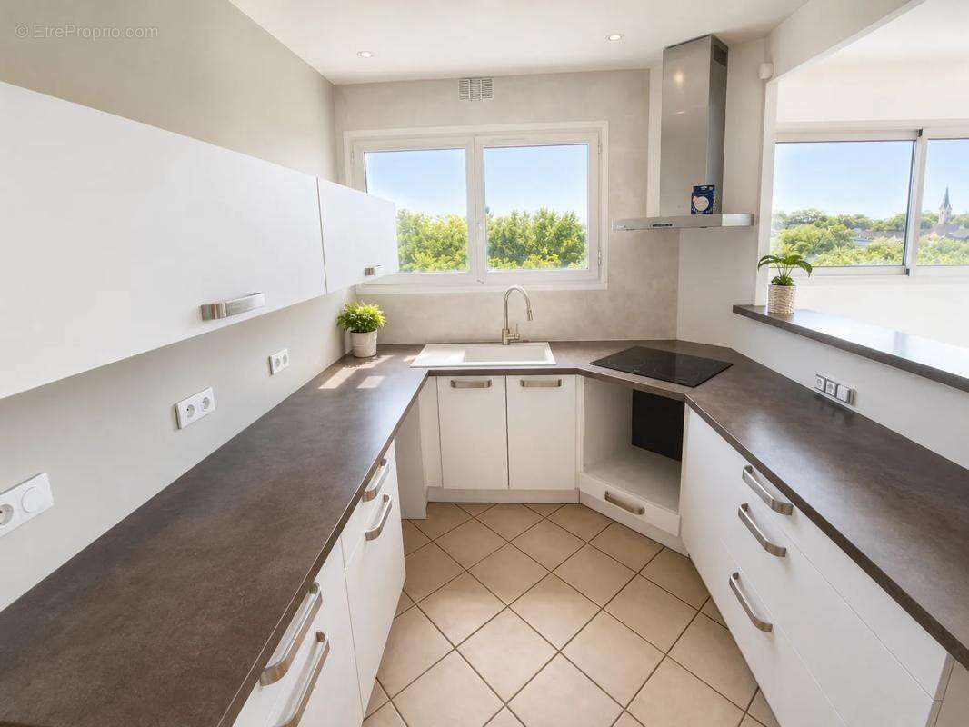 Appartement de 4 pièces de 96 m² à Sens - photo 3