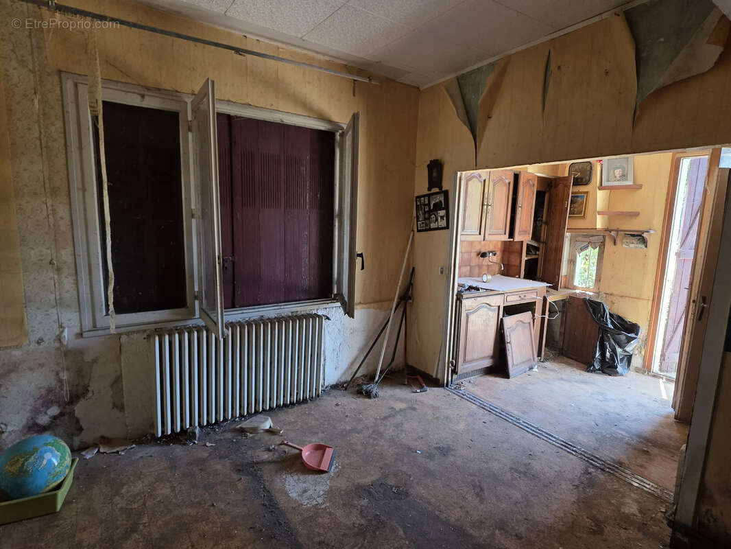Maison à rénover avec fort potentiel - photo 7