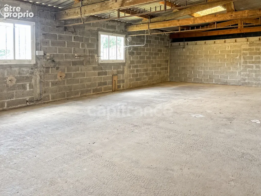Maison avec local commercial à vendre centre ville SAVIGNE L'EVEQUE (72) - photo 12