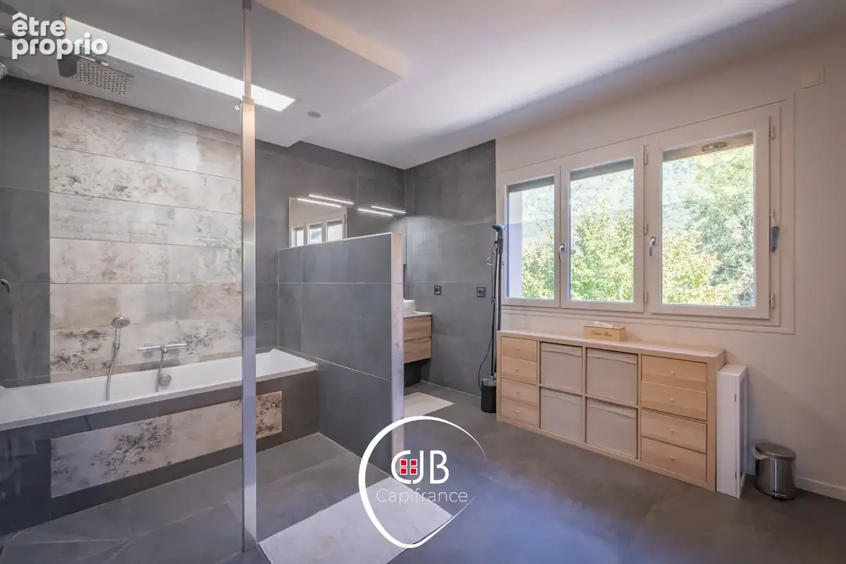 Sonnaz – Maison 220 m², DPE B et appartement en rez-de-jardin - photo 33