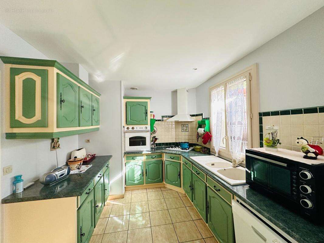 Maison  5 pièce(s) 109 m2 avec garage et dépendances - photo 8