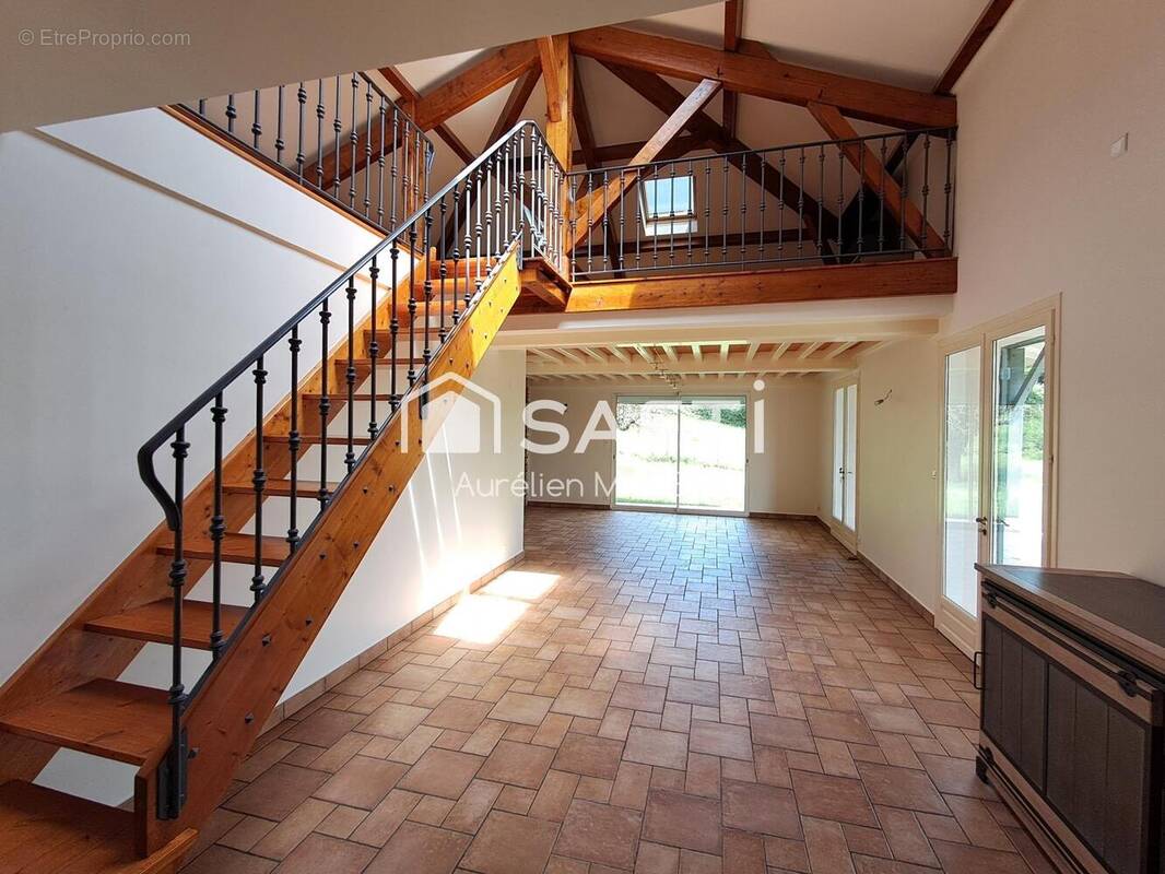 Photo 1 - Maison à VILLIEU-LOYES-MOLLON