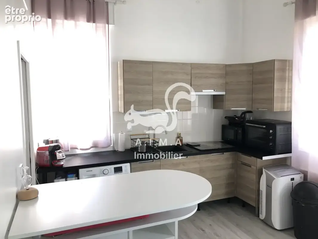 MIOS. EXCLUSIVITE. Appartement T2 en centre bourg avec deux  places de stationnement. - photo 3