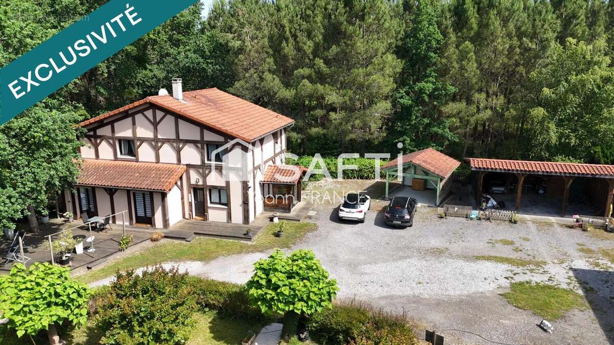 Photo 2 - Maison à SAINT-JULIEN-EN-BORN