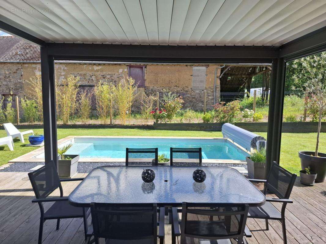 Maison à ANDOUILLE-NEUVILLE