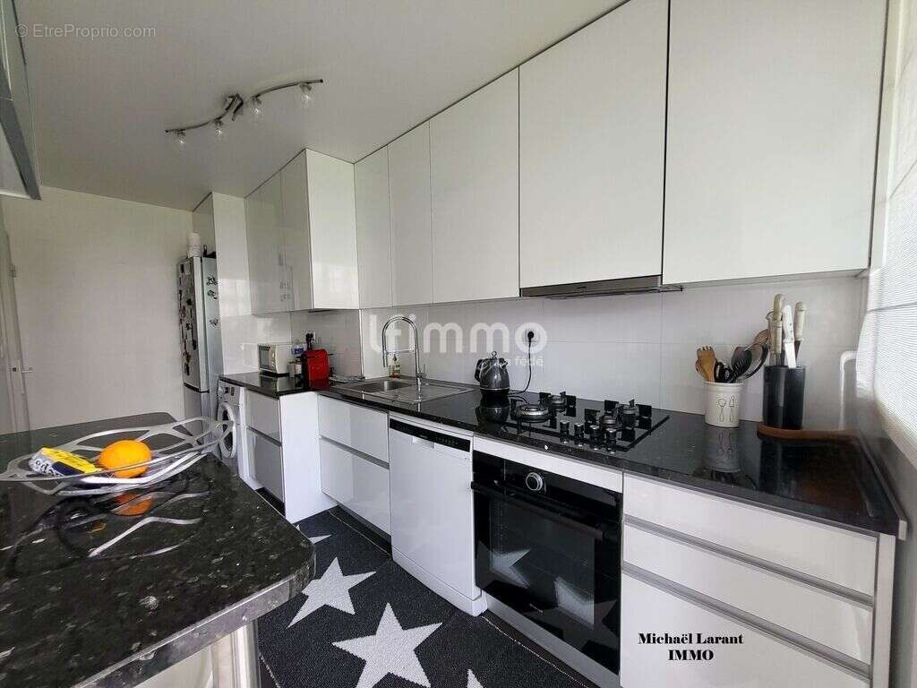 Appartement T4 entièrement rénové - photo 3