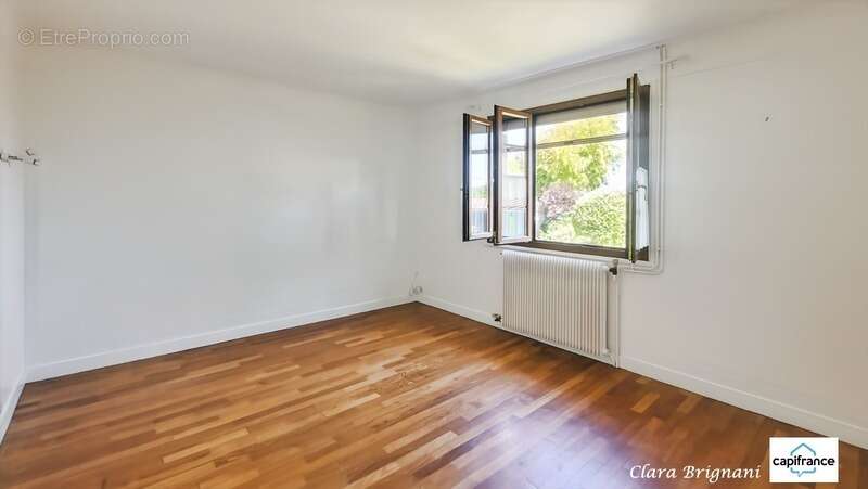 Maison à vendre - 6 pièces, 156m² à Avrainville - sous-sol total et terrain arboré de 1 555 m² - photo 8