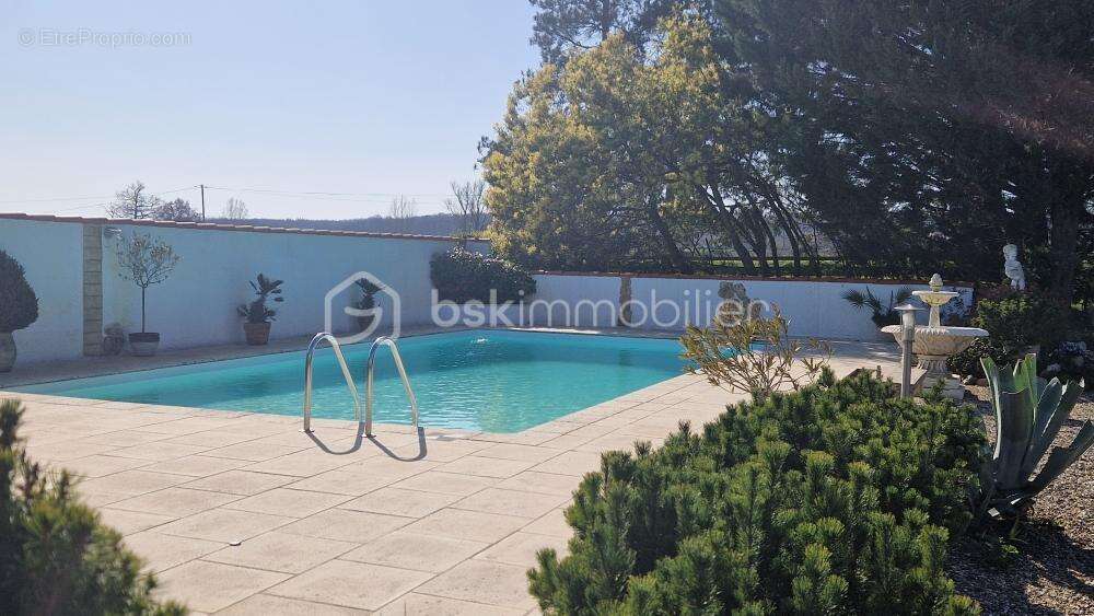 Maison plain pied - 4 chambres - veranda - grand garage - parc arbore - photo 6