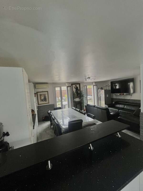 Photo 2 - Maison à AUBERVILLIERS