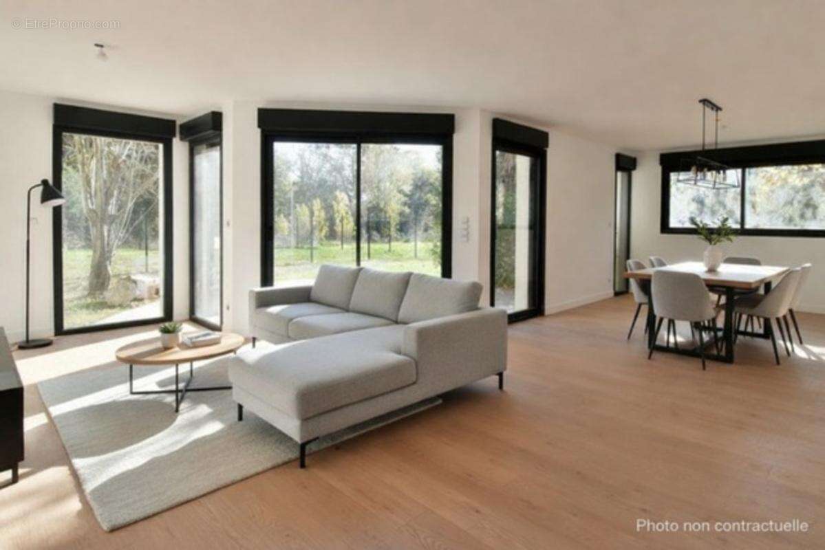EXCLUSIVITE - Appartement T4 rez de jardin - Garage et parkings - photo 5
