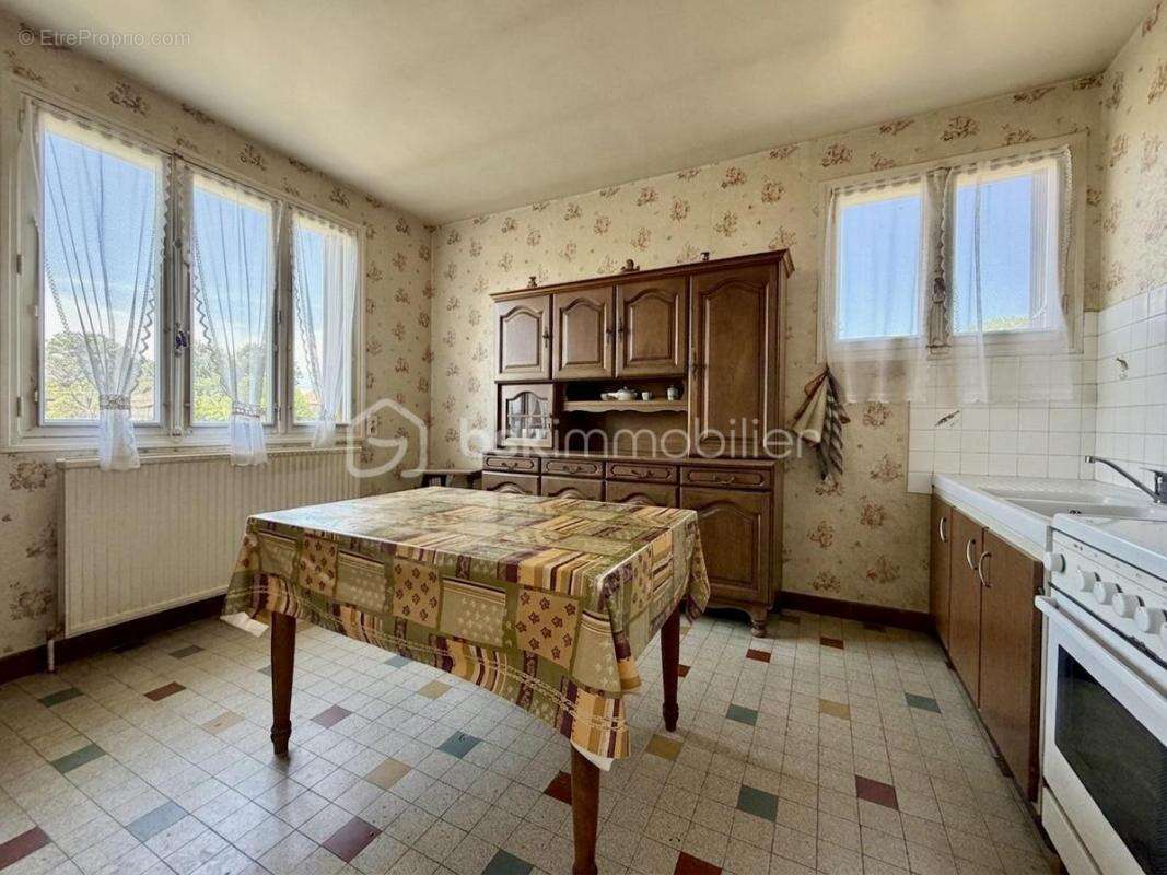 Maison élevée sur sous-sol de 152 m² - photo 3