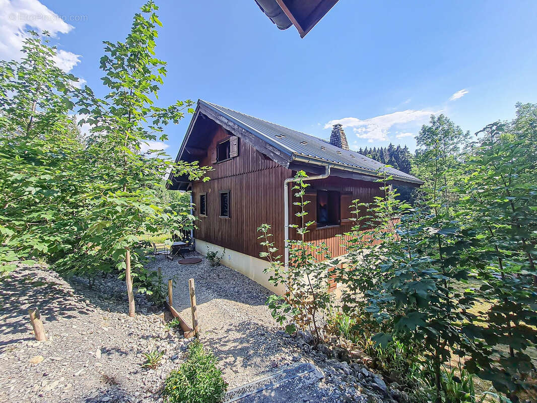 Chalet de 100m2 - parcelle de 800m2 - bogeve 74250 - photo 7