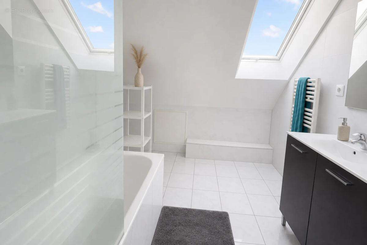 Maison de 170 m² à Tartigny avec jardin spacieux - photo 9