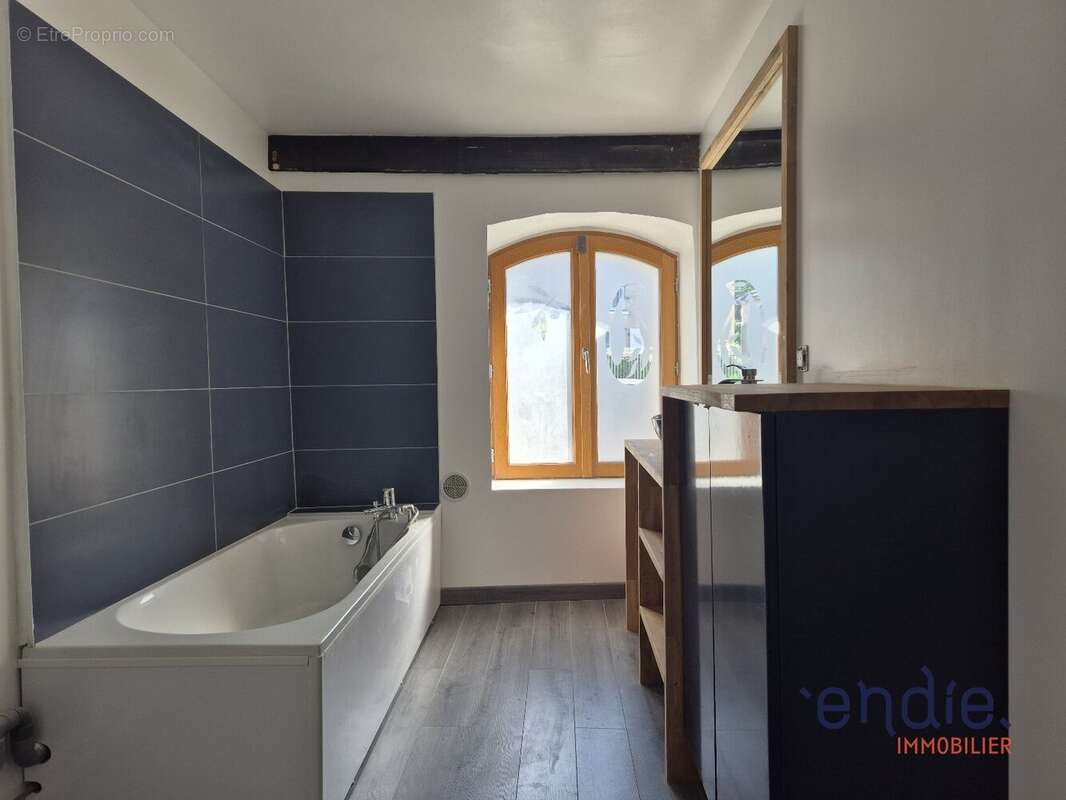 Maison de 91m 2 en pierres avec poutres apparentes - photo 3