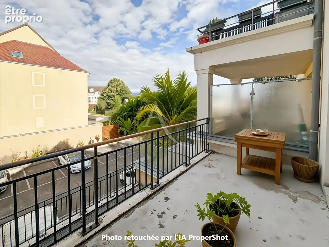 COEUR DE VILLE Appartement F3 de 67 m2 avec terrasse de 9 m2, 1 place de parking en sous-sol sol - photo 10