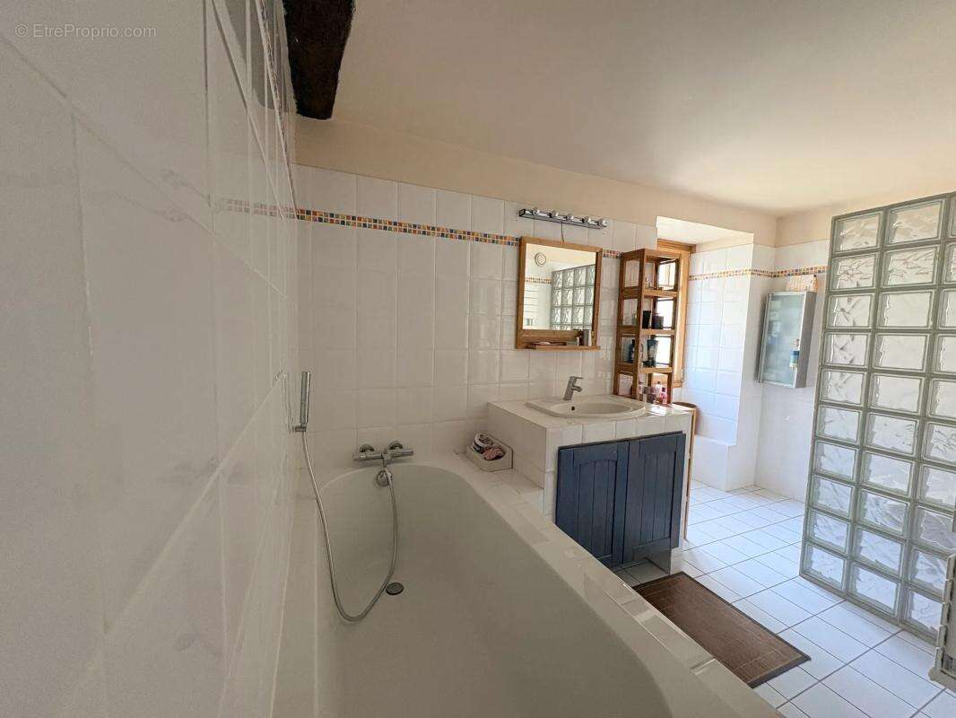 Maison de 7 pièces de 240 m² - photo 21