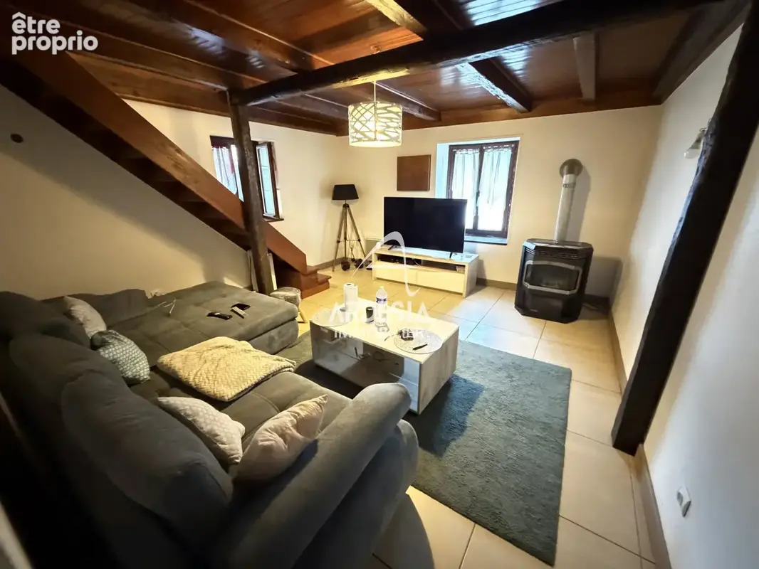 Maison mitoyenne avec terrasse couverte et potentiel d’aménagement - photo 1