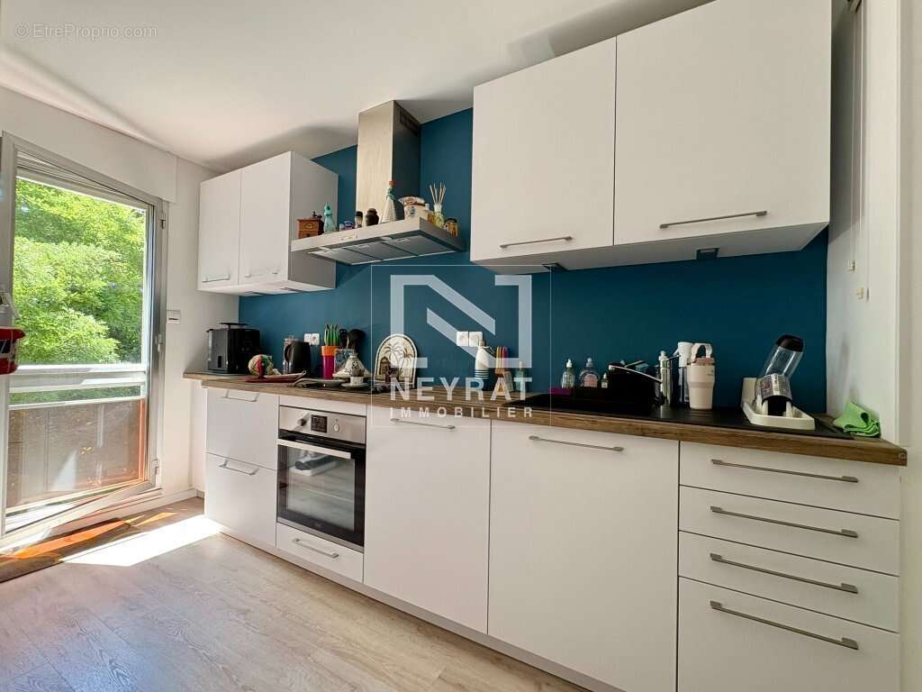 Appartement avec balcon, cave et garage privatif - Environnement verdoyant - Quartier Wilson / Allées du parc - photo 9