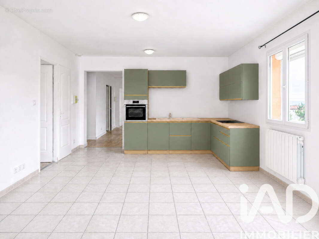 Photo 2 - Appartement à SAINT-GENIS-LAVAL