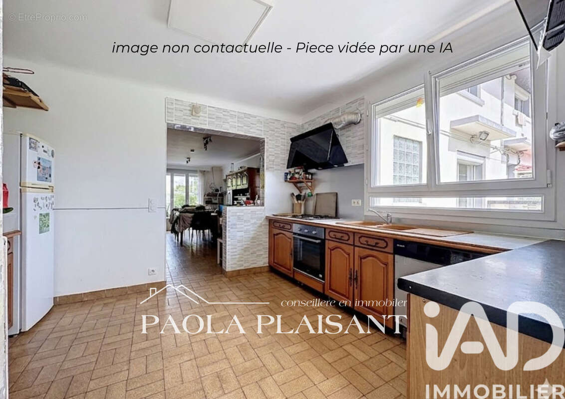 Photo 2 - Maison à TREMBLAY-EN-FRANCE