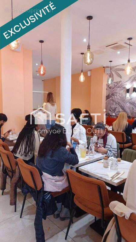 Photo 1 - Commerce à PARIS-18E