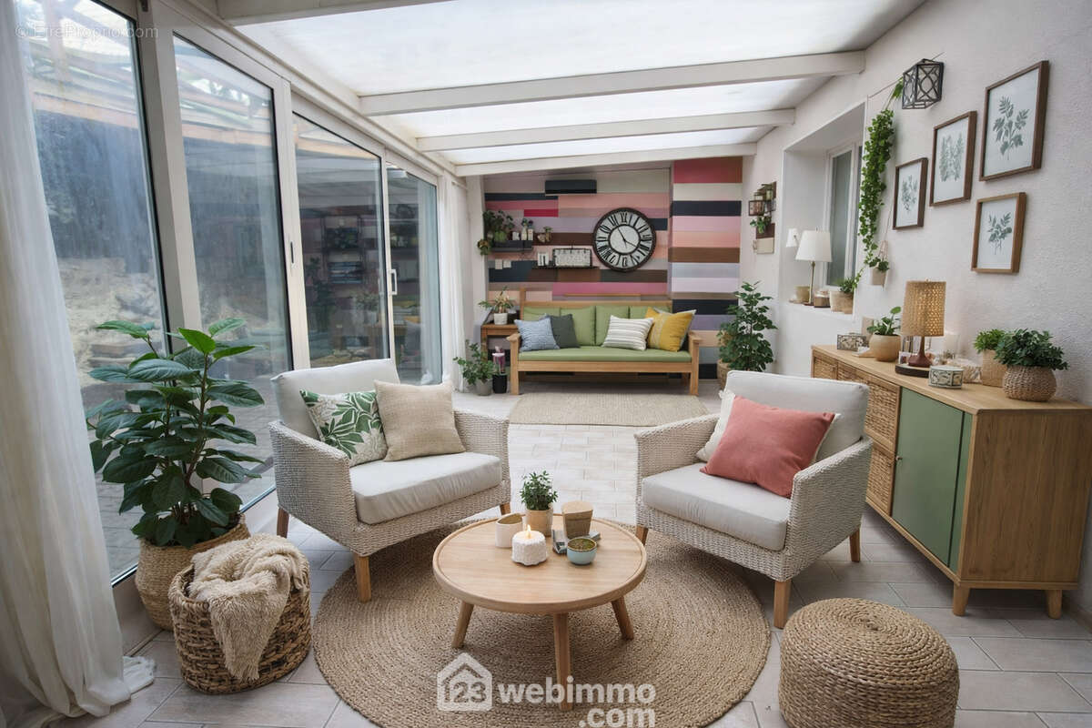 La véranda de 18 m² donnant sur une courette intérieure - Maison à COURCELLES-SUR-VESLES