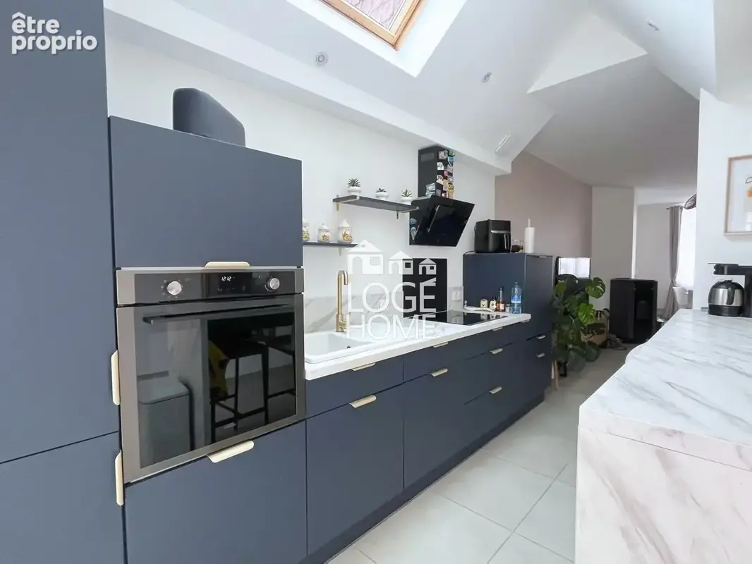 Maison 4 pièces 82 m² à vendre à Hem (59510) - photo 4