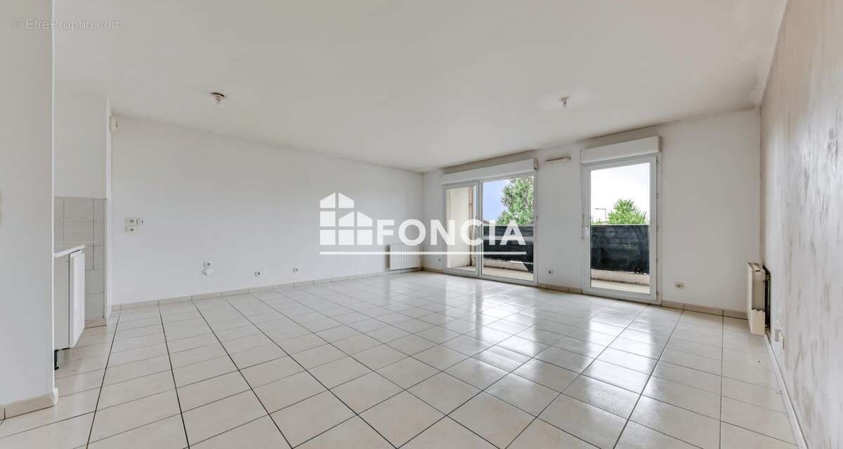 VAULX-EN-VELIN – T3 de 64 m² avec balcon et garage en résidence sécurisée de 2010 - photo 3