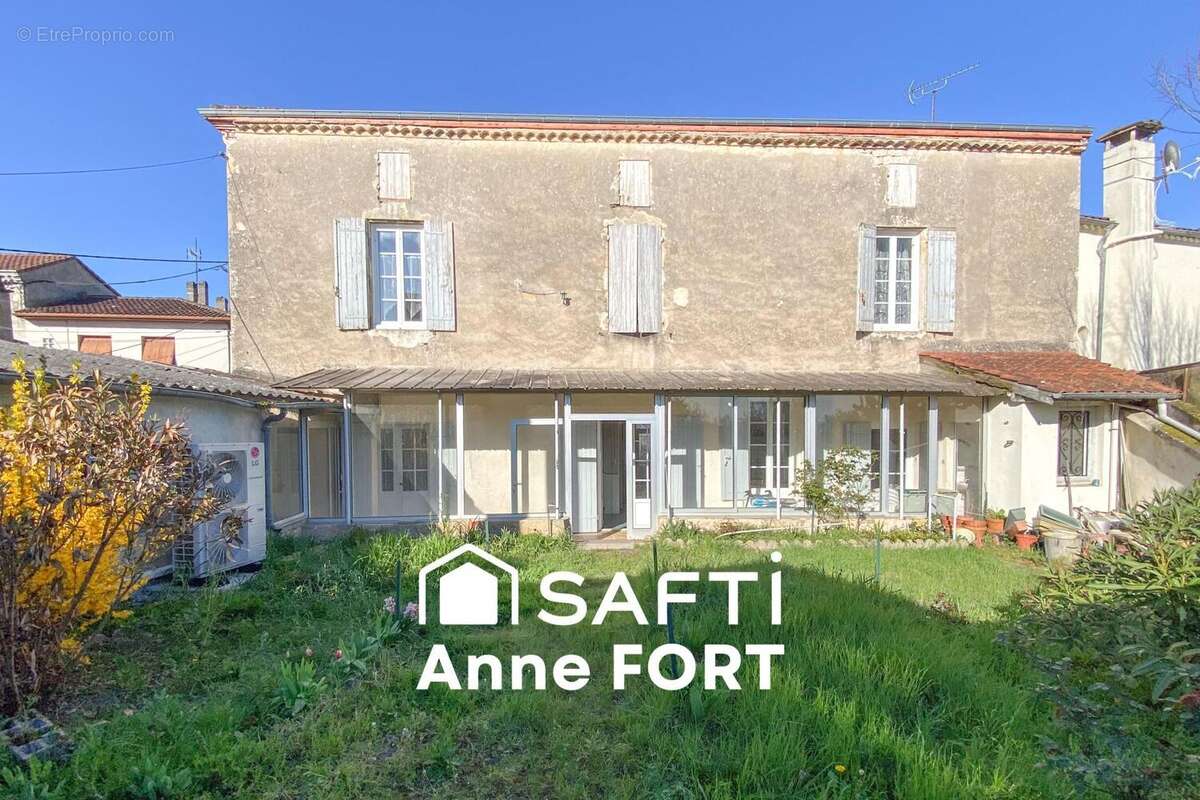 Photo 1 - Maison à LAROQUE-TIMBAUT