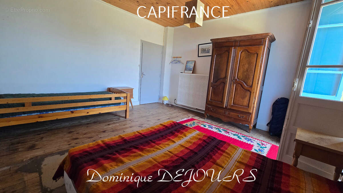 Nichée au cœur de la nature, sans vis-à-vis et avec une vue remarquable, grande maison de 7 (voir 8) chambres et de belles terra - photo 15