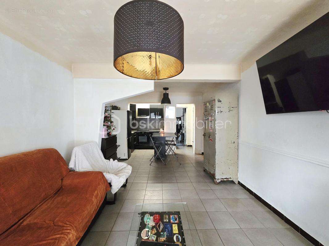 En exclusivite - rez-de-chaussee- centre-ville - photo 2