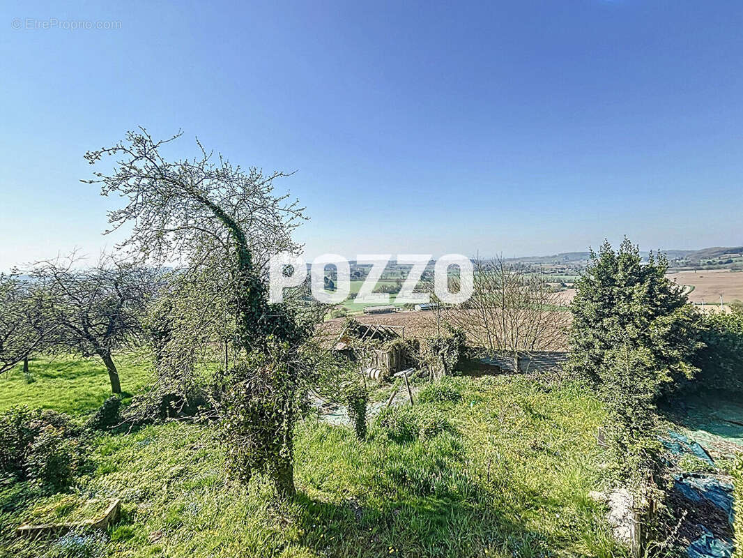 Maison à JUVIGNY-LE-TERTRE