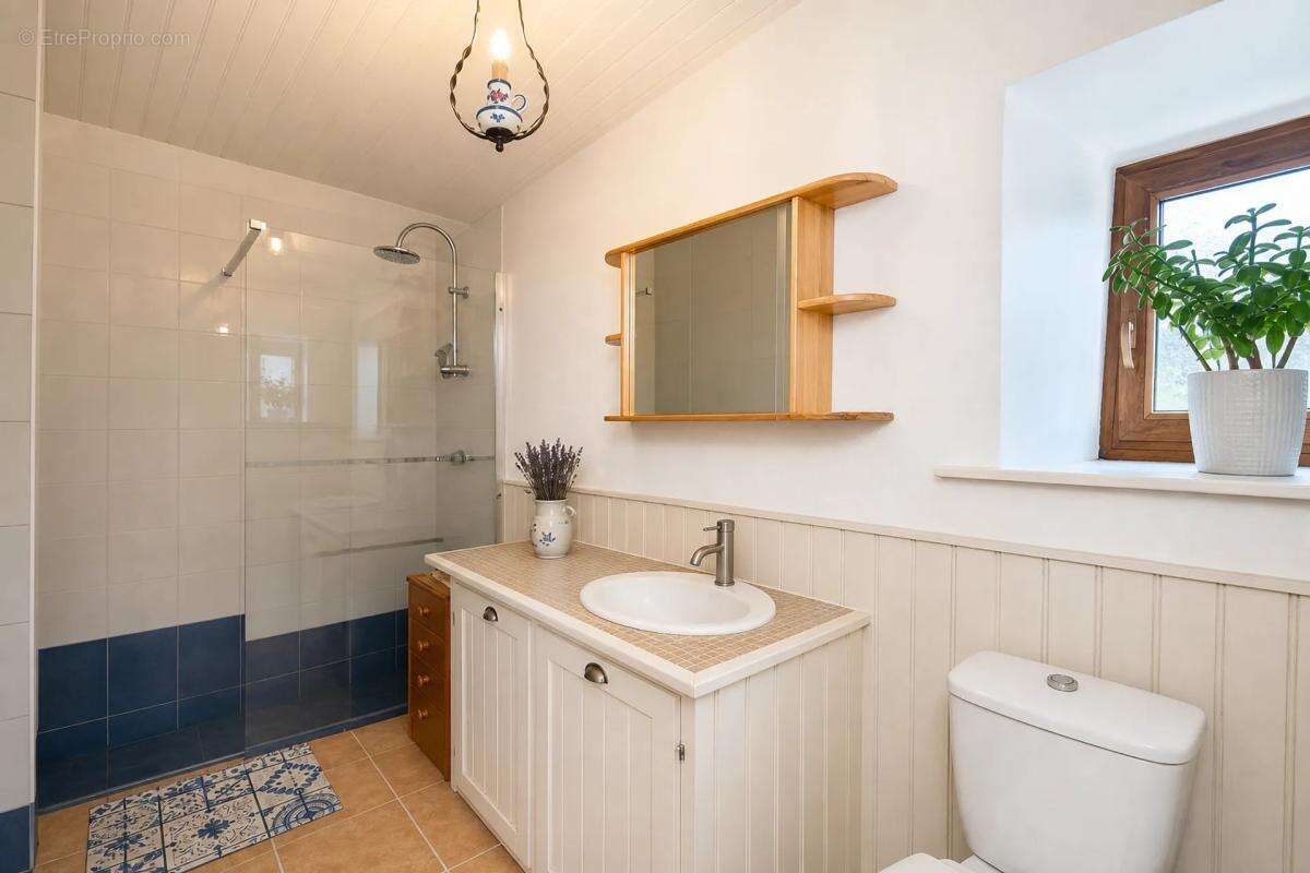 Maison de 7 pièces de 110 m² à Juvigny-Val-d'Andaine - photo 11