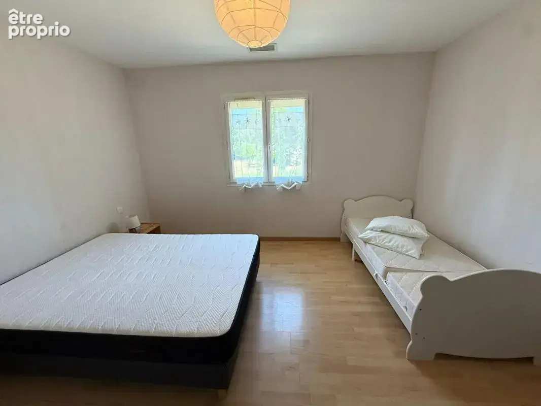 Maison plain-pied Montlegun 190 m² sur vaste terrain arboré avec terrasse et garage indépendant - photo 19