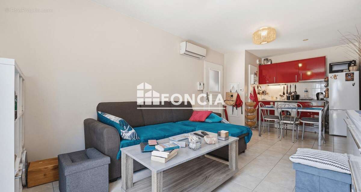 Appartement 2 pièces de 42m2 en rez-de-jardin avec terrasse et parking - loué - photo 4