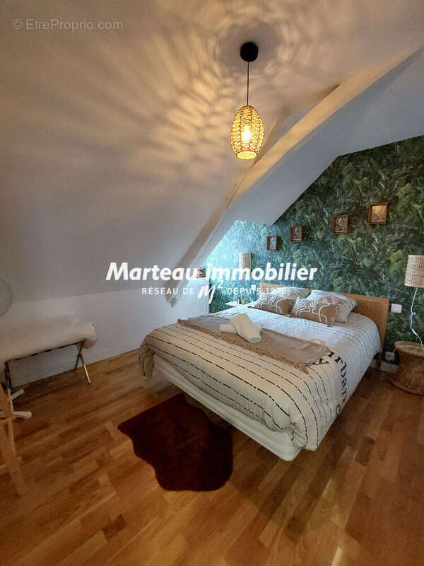 Maison à ARNAGE