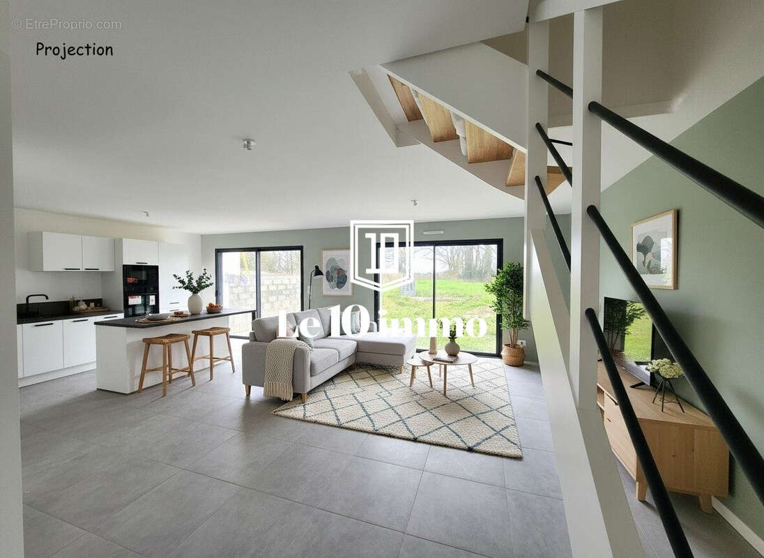 Pièce de vie avec projection - Maison à BLAIN