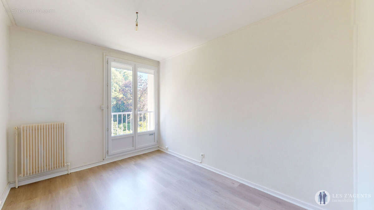 Appartement T3 de 64m2 avec balcon + cave + place de parking - photo 8