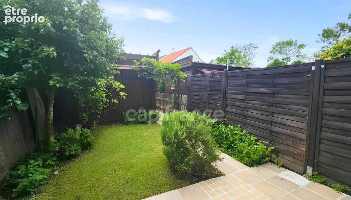 Maison 85 m² – Quartier Grande Ile – Jardin, terrasse, garage et belle luminosité - photo 4