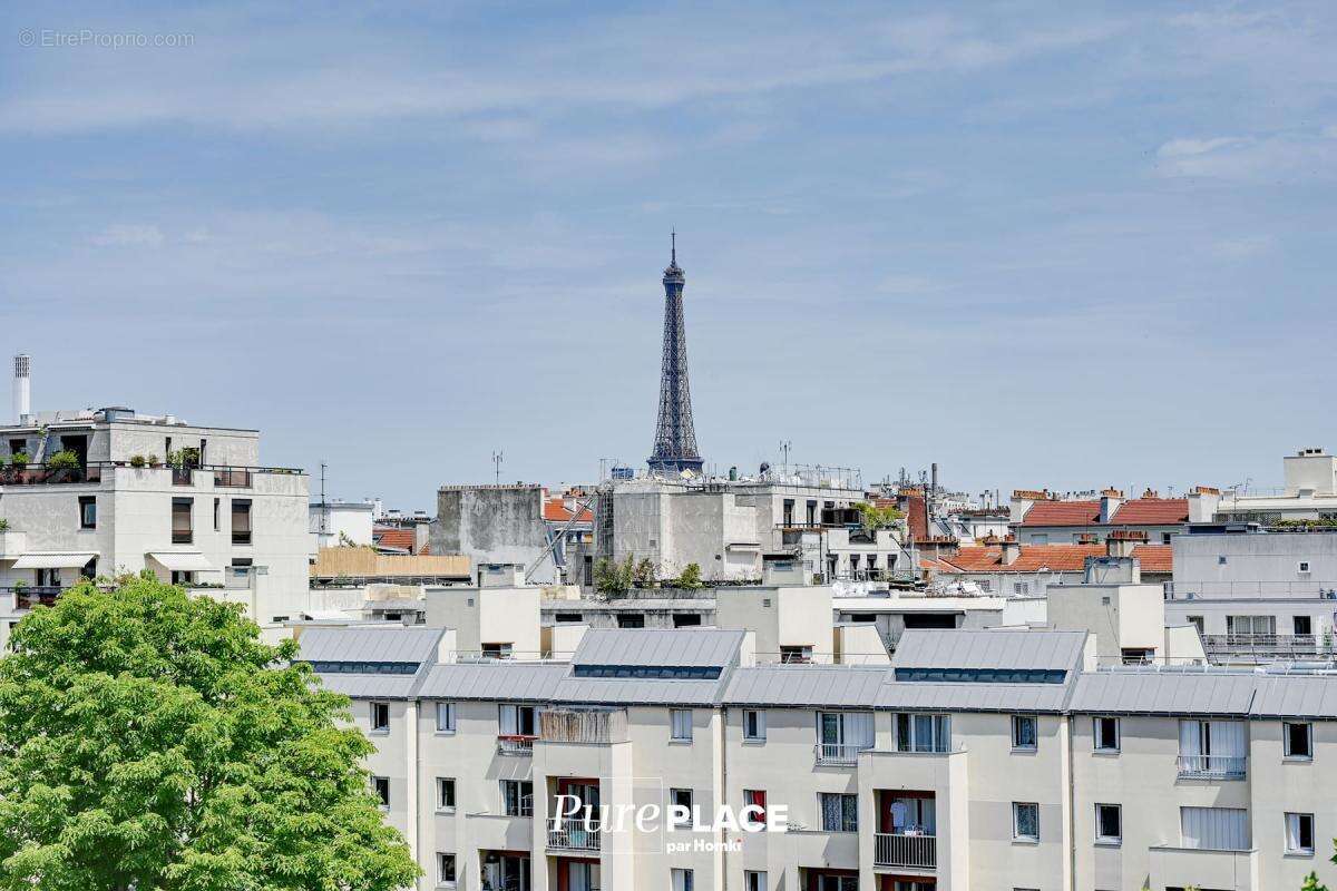 Dernier étage baigné de lumière avec vues Tour Eiffel - photo 12