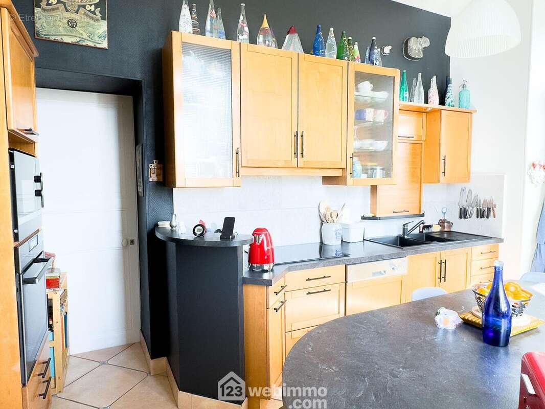 La cuisine de 13.50m² est équipée - Maison à CHOLET