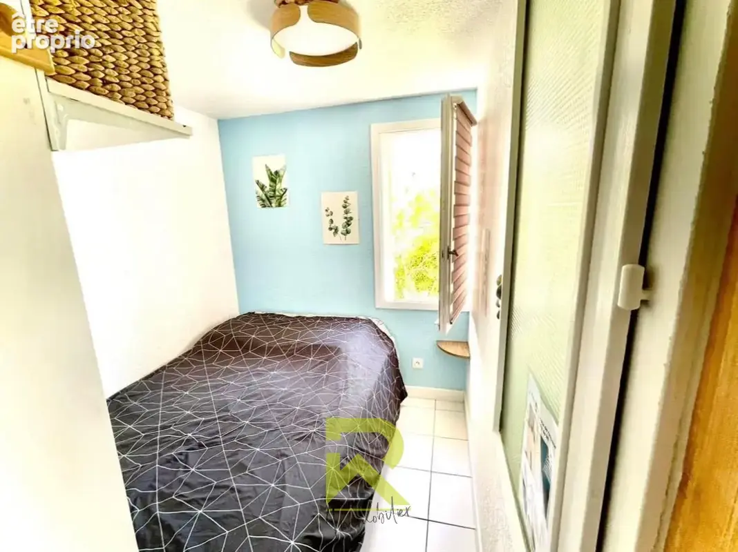 T2 en rez de jardin avec parking privé - photo 5