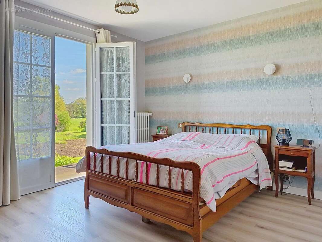Maison 121 m² à Guesnes  - photo 6