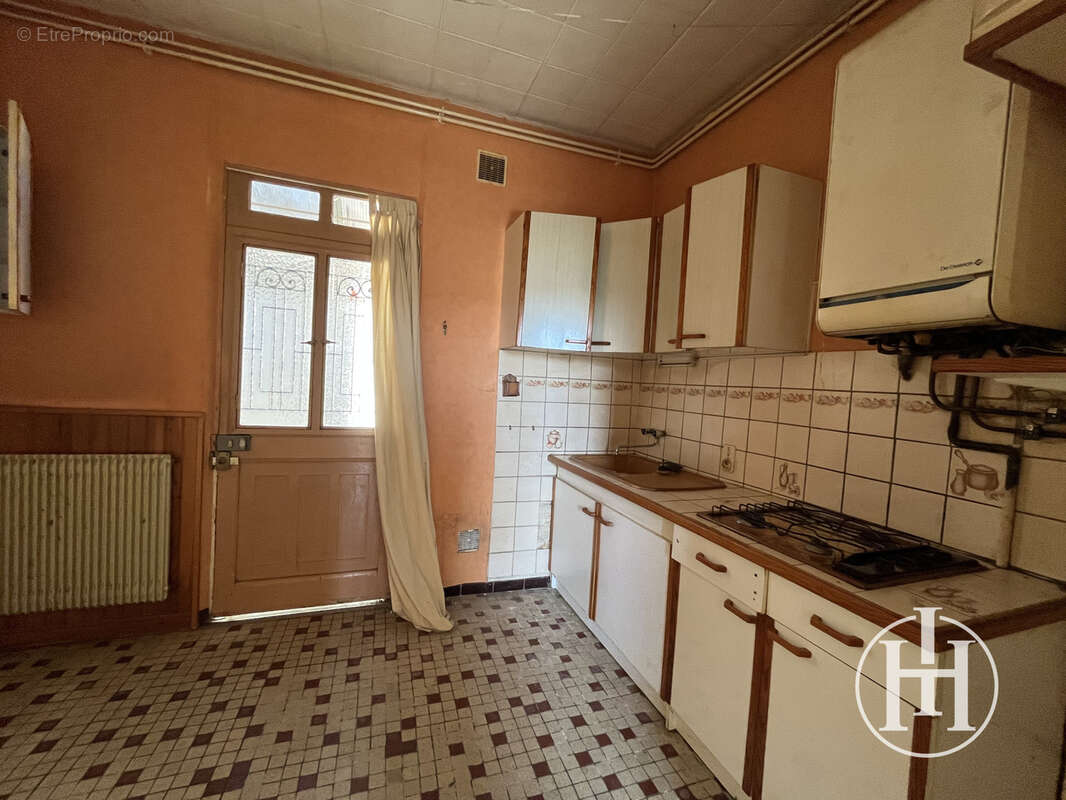 Maison de plain-pied avec terrain   Montluçon - photo 2