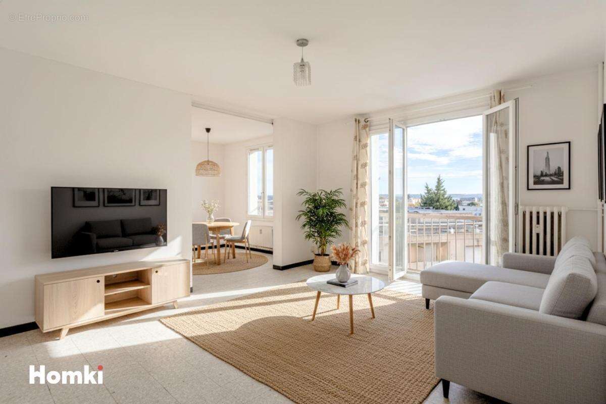 Appartement 3 pièces de 69m² avec parking et vue à Nîmes Jean-Jaurès - photo 2