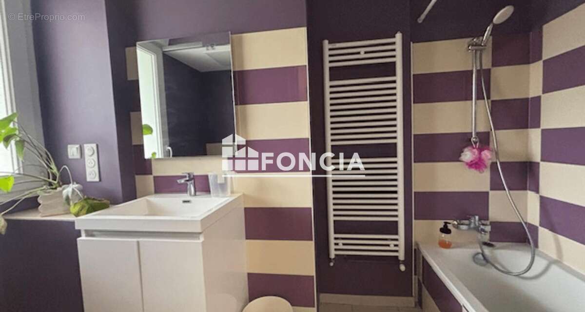Appartement t2 bis en rez-de-jardin - photo 4