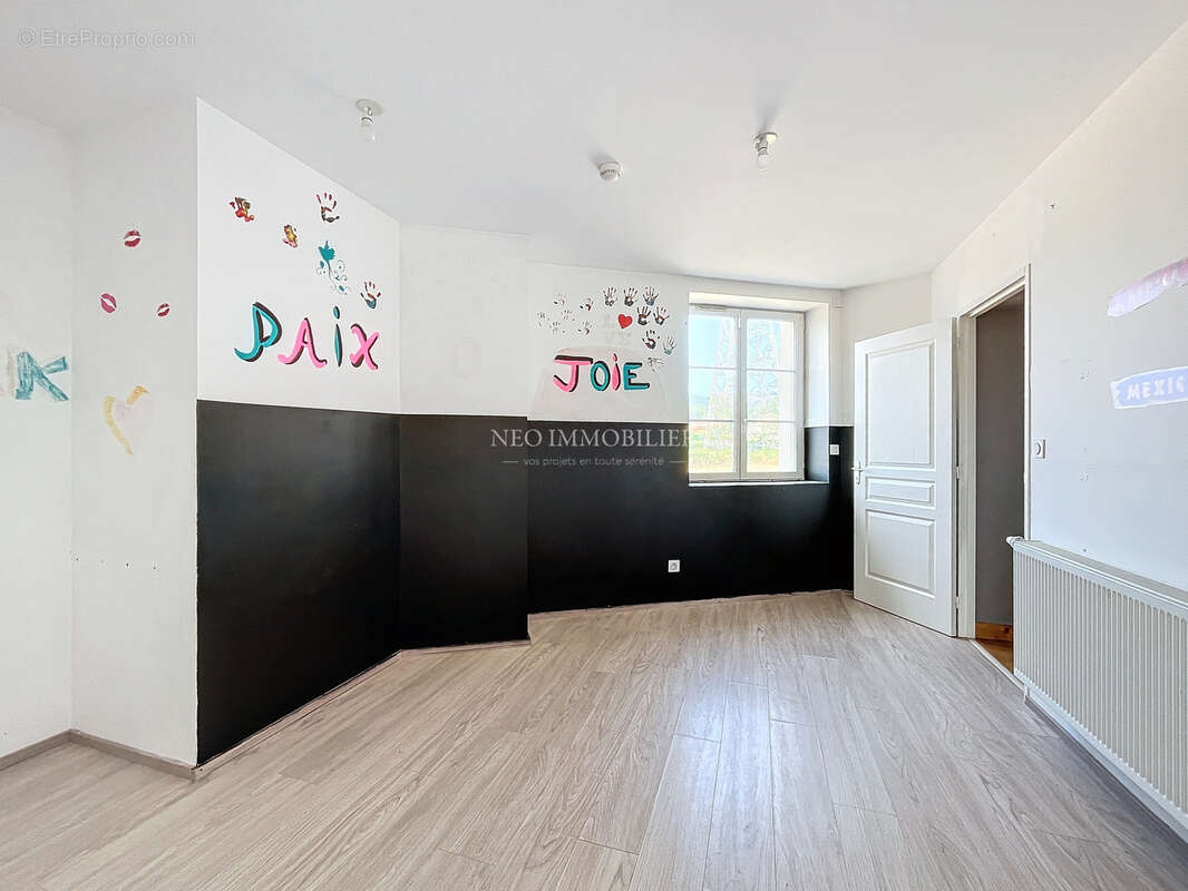 Maison à GREZIEU-LA-VARENNE