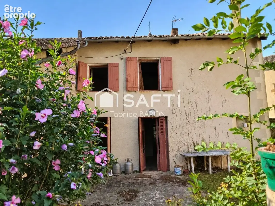 Photo 1 - Maison à PRESSAC