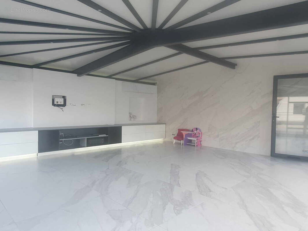 Logement atypique de 96 m2 sur parcelle de 983m2 - photo 12