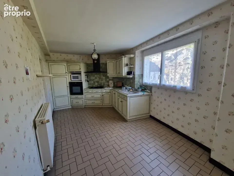 Maison de caractère avec jardin, garage et beau potentiel ? - photo 2